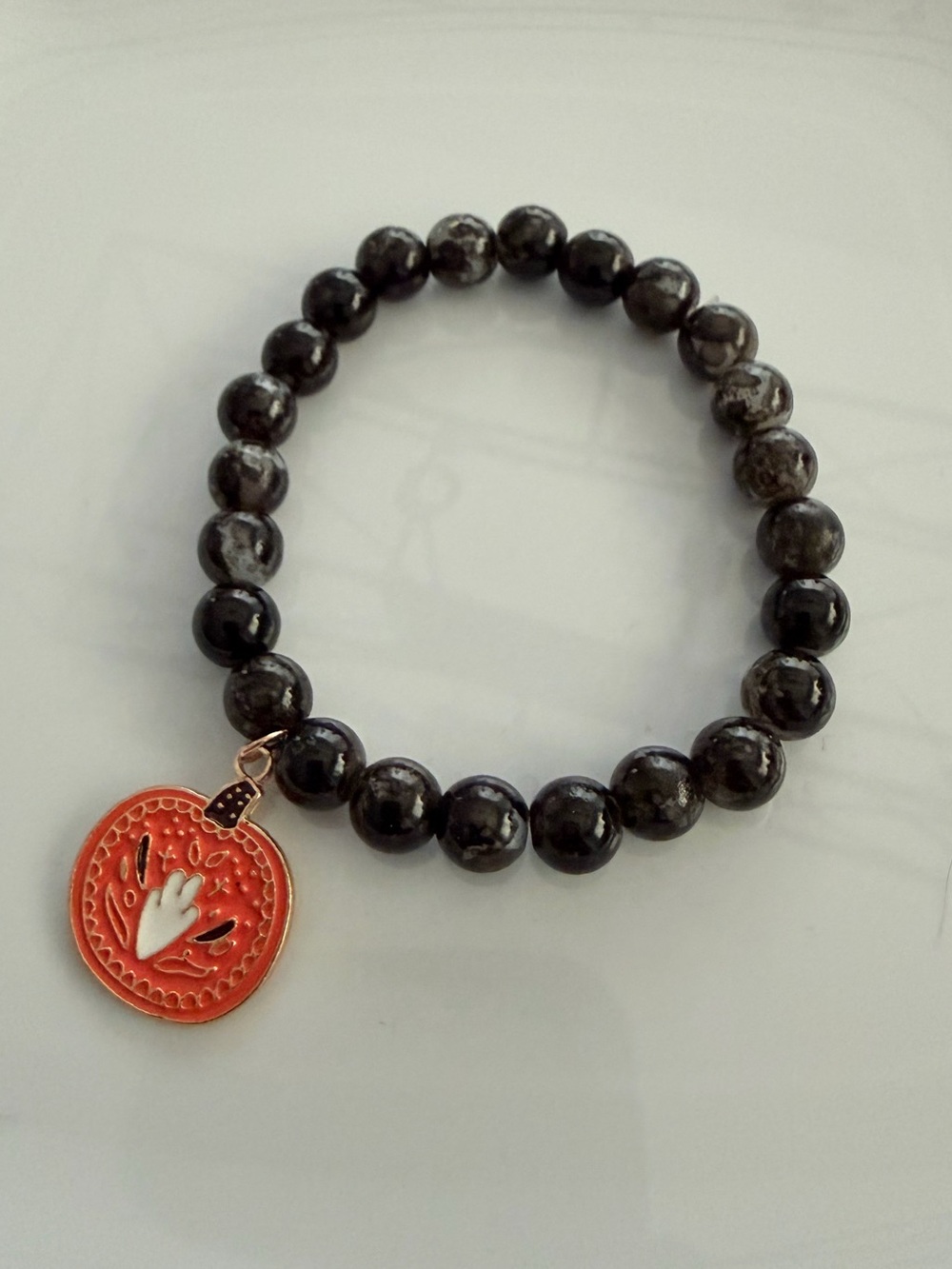 Black Beaded Stretch Bracelet with Floral Pumpkin Charm